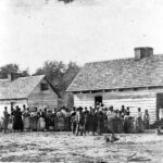 Large Group of Slaves Standing in Front of Buildings On Smith’s Plantation, Beaufort, South Carolina